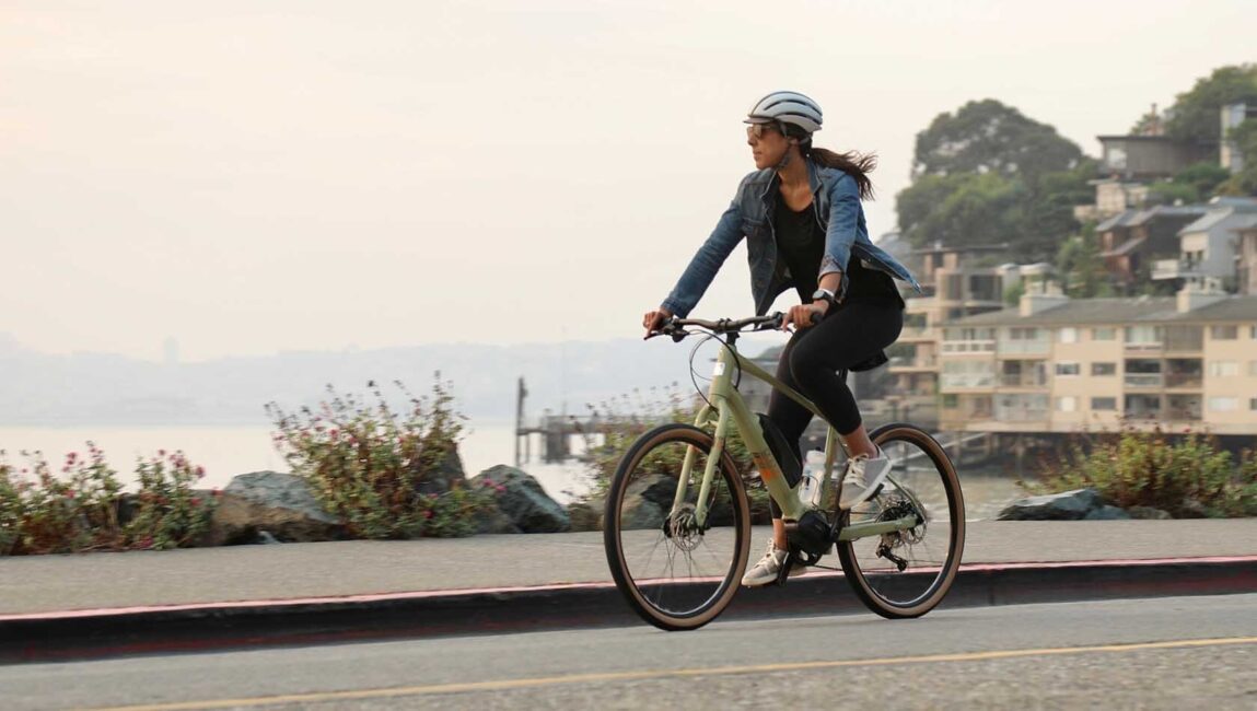 woman riding a mid-drive electric bike