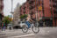 Priority Current being ridden through an urban street